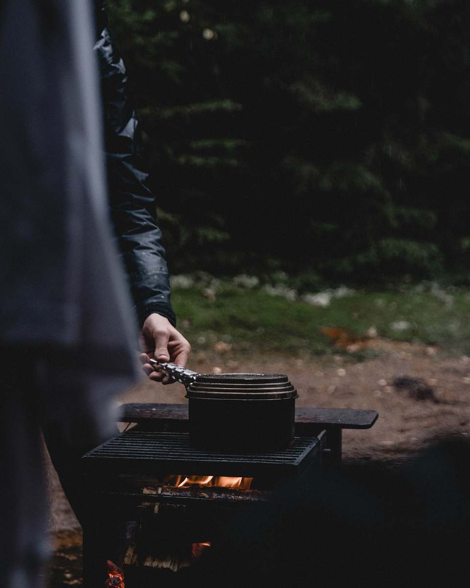 leisure activities person standing beside black firepit grand piano